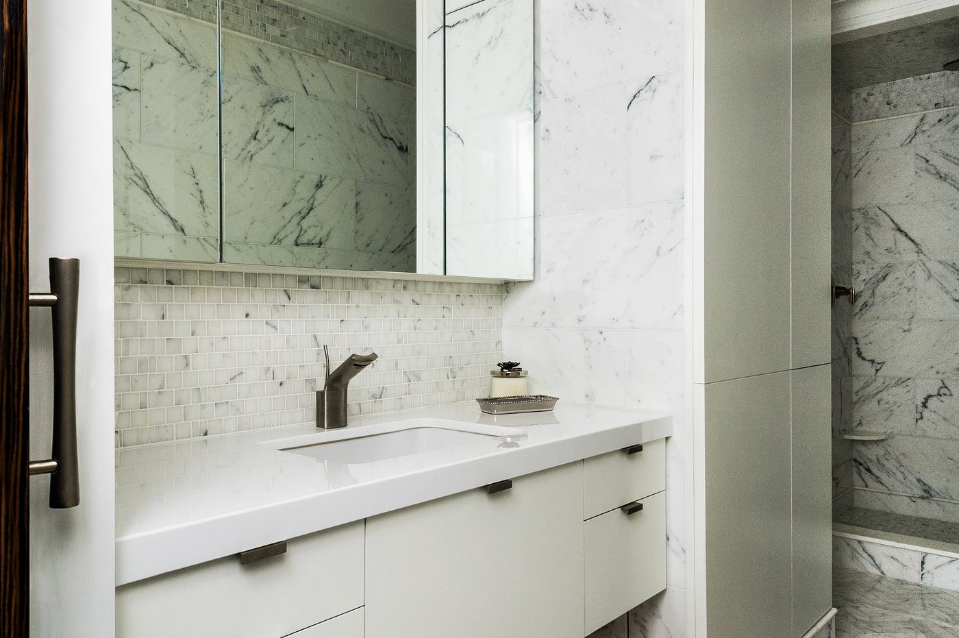 Carrara marble bathroom craftsmanship by Zezula Renovation